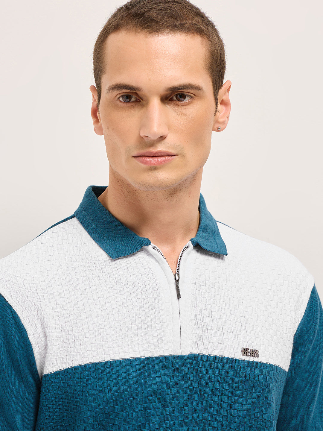 Men Blue Self Design Cotton Polo