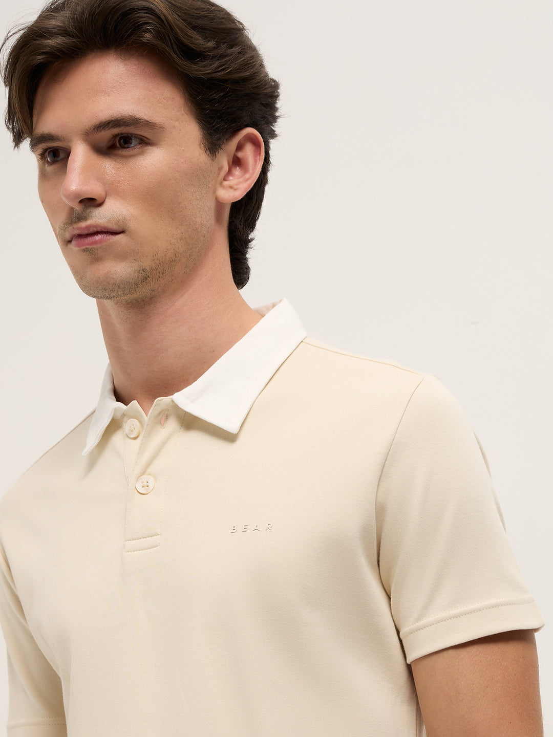 Men Beige Solid Slim Fit Polo