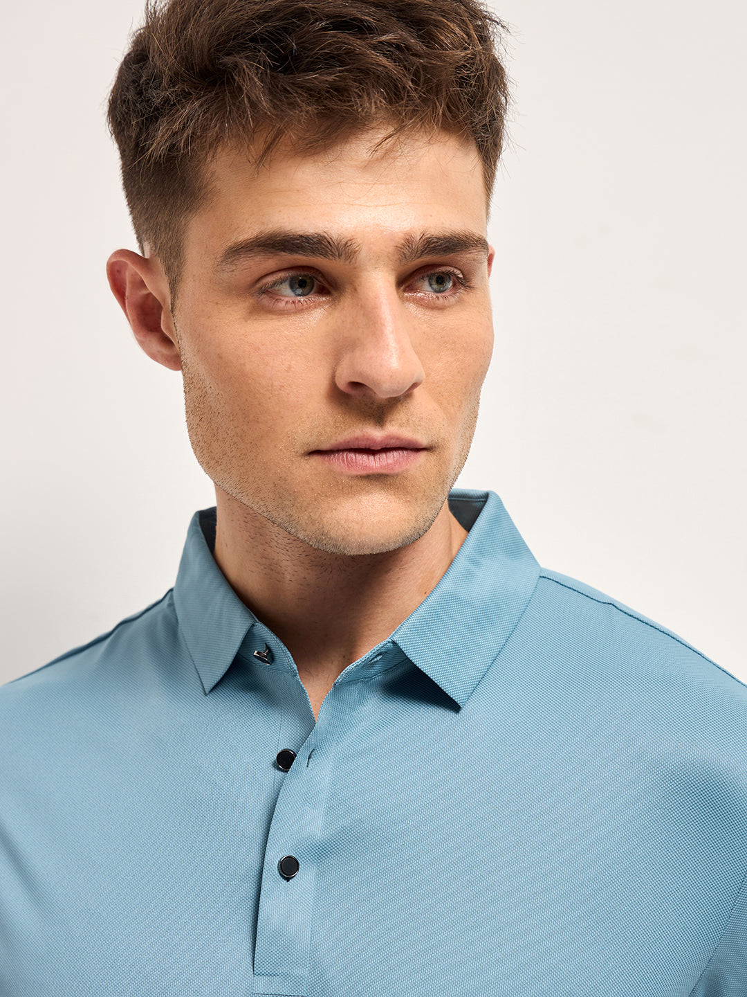Men Sky Blue Self Design Slim Fit Polo T-shirt