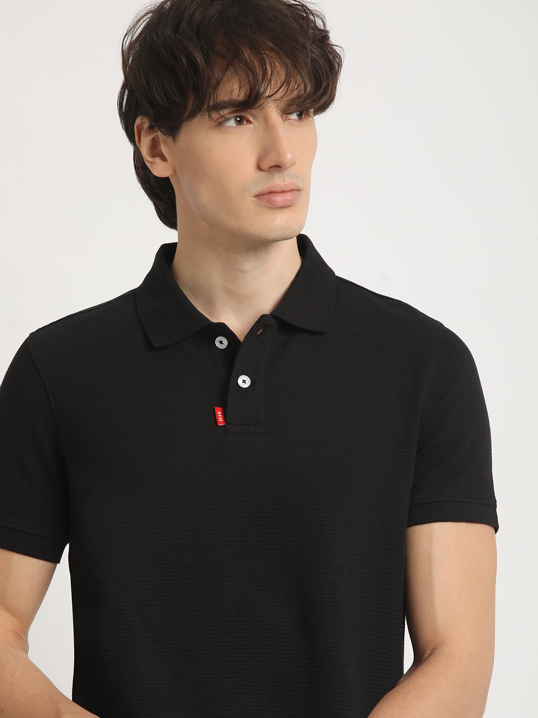 Men Black Self Design Regular Fit Polo Collar Tshirt