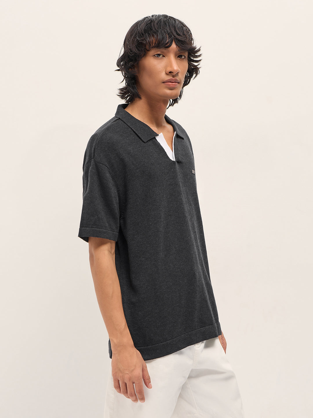 Men Black Solid Relaxed Fit Polo