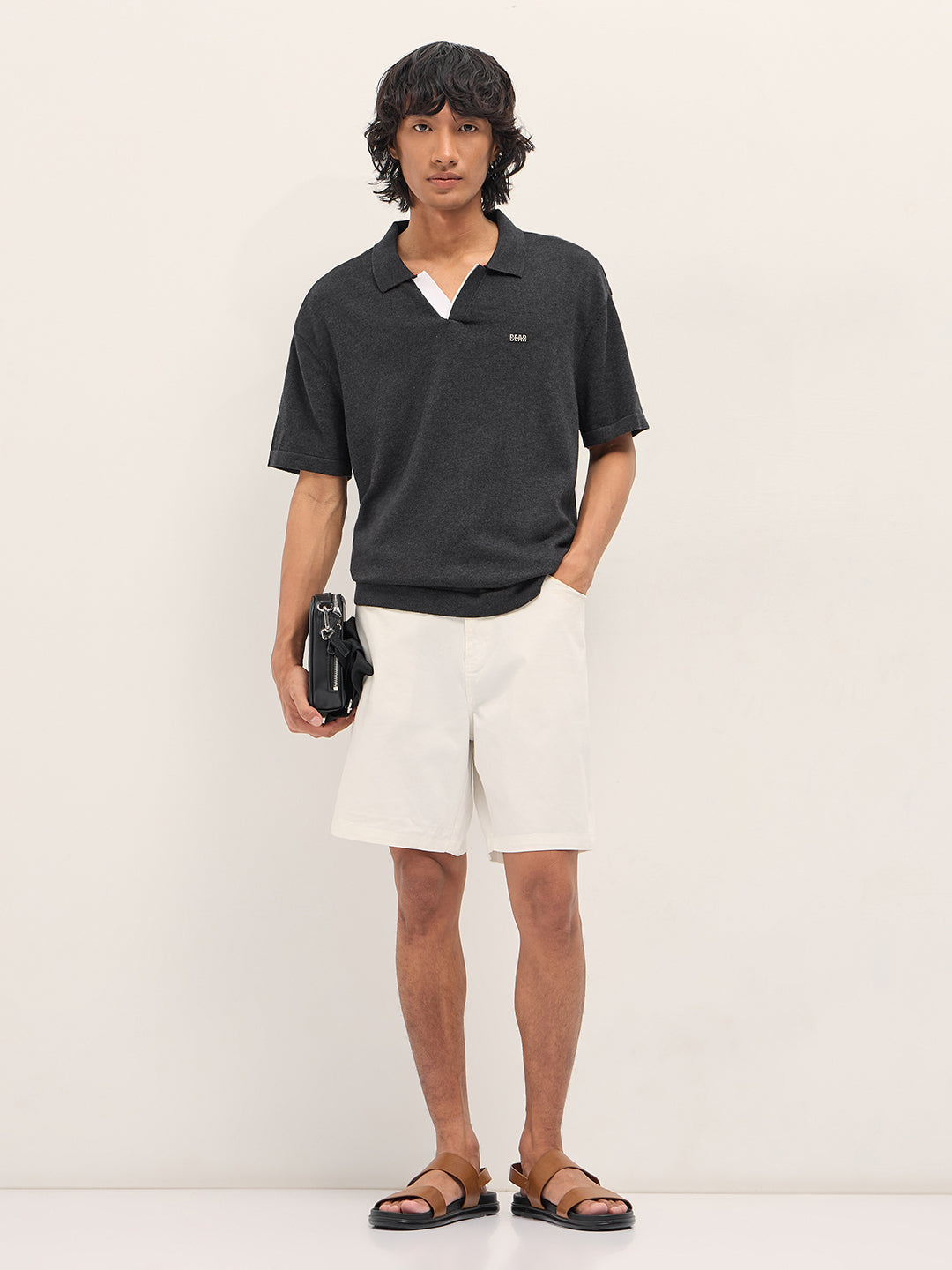 Men Black Solid Relaxed Fit Polo