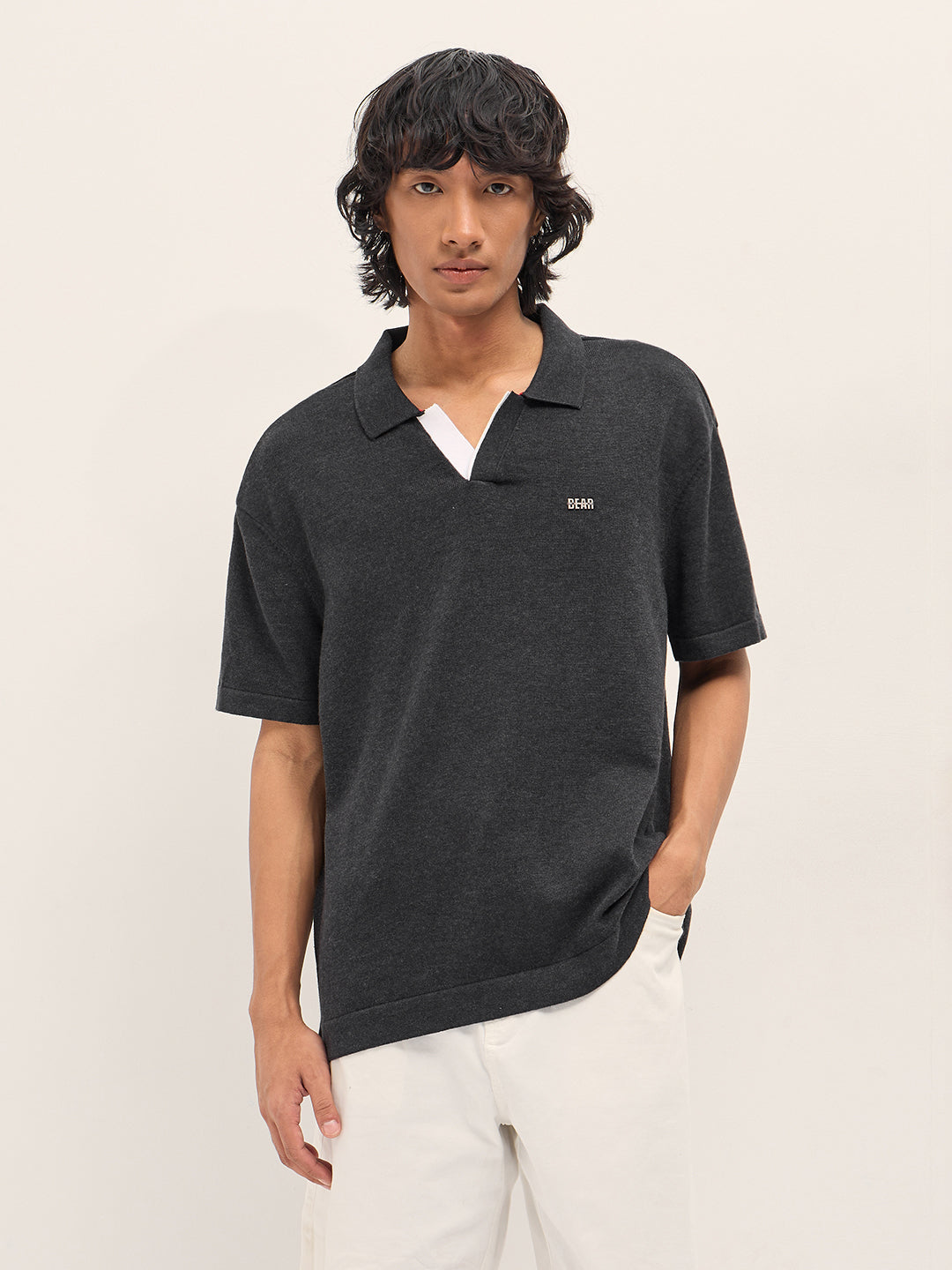 Men Black Solid Relaxed Fit Polo