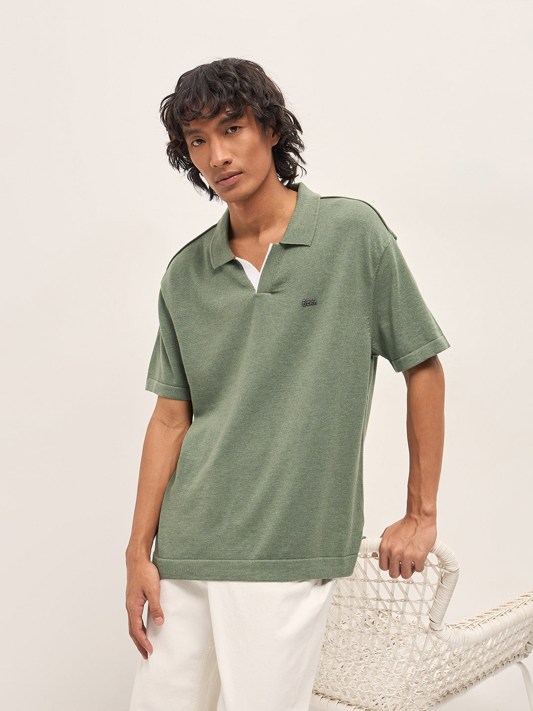 Men Green Solid Relaxed Fit Polo