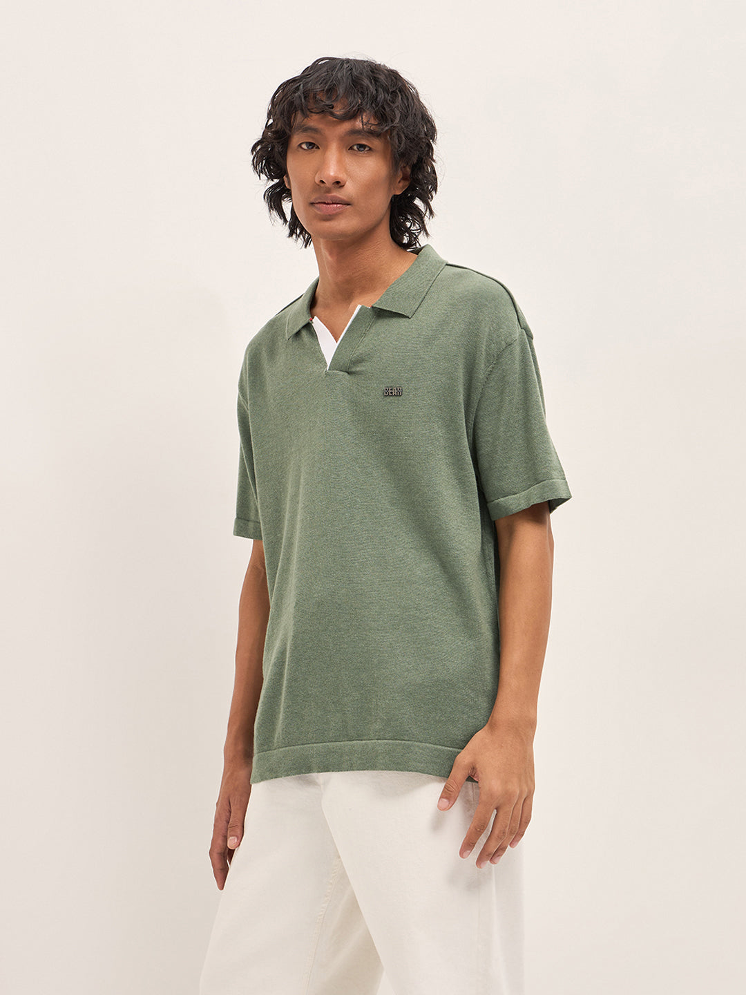 Men Green Solid Relaxed Fit Polo