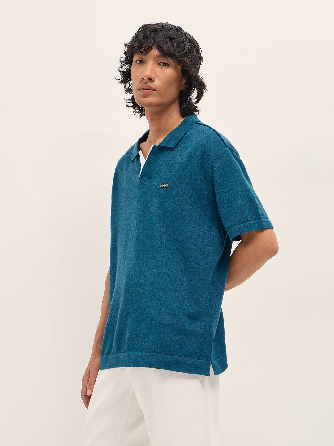 Men Teal Solid Relaxed Fit Polo