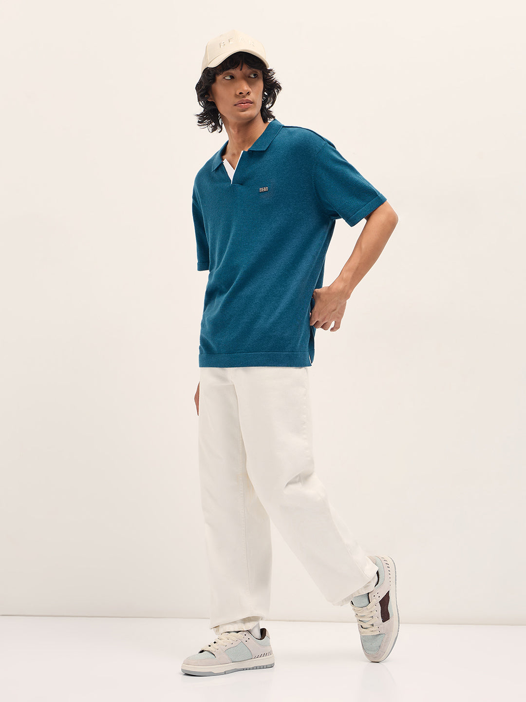 Men Teal Solid Relaxed Fit Polo