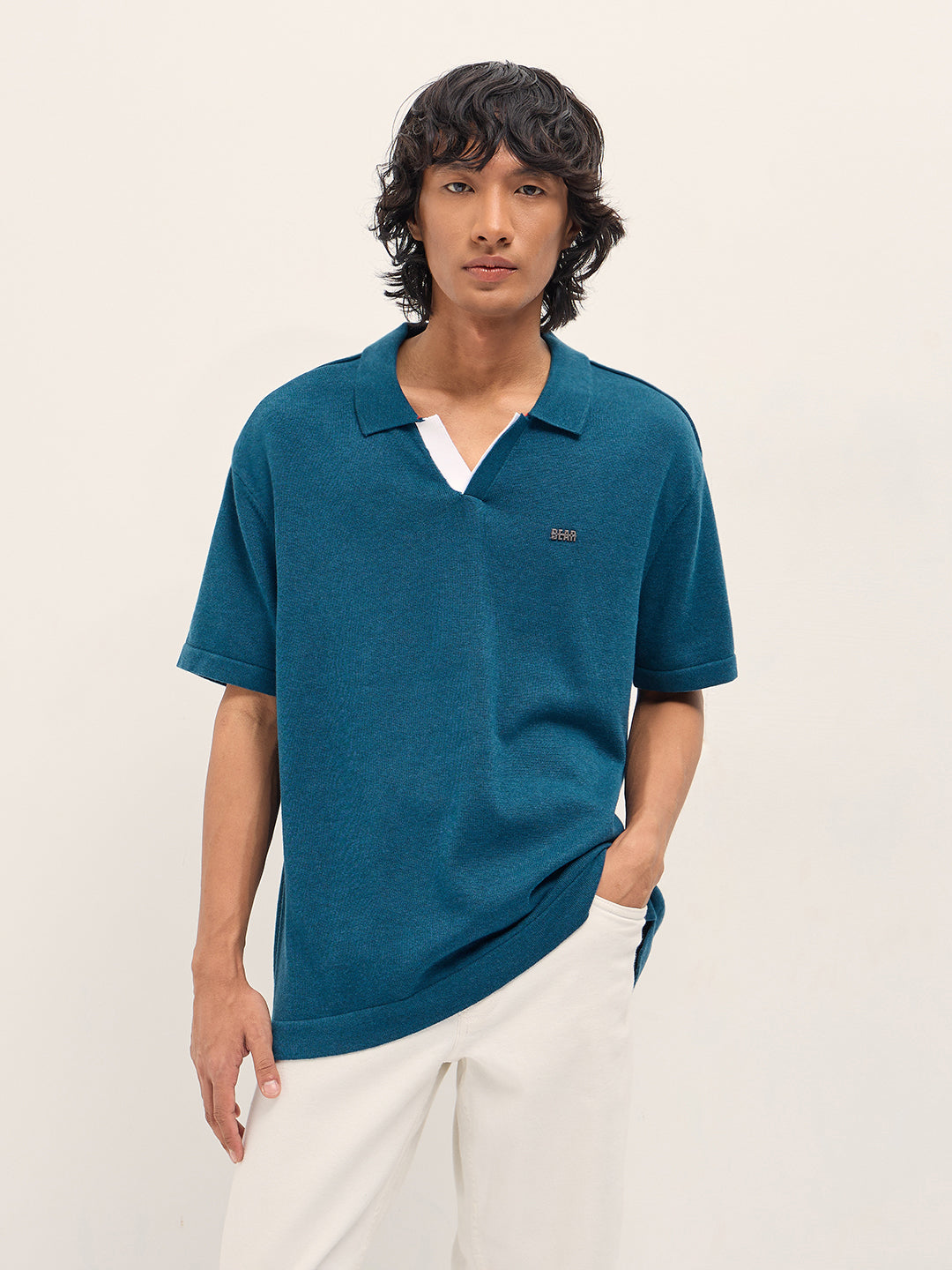 Men Teal Solid Relaxed Fit Polo