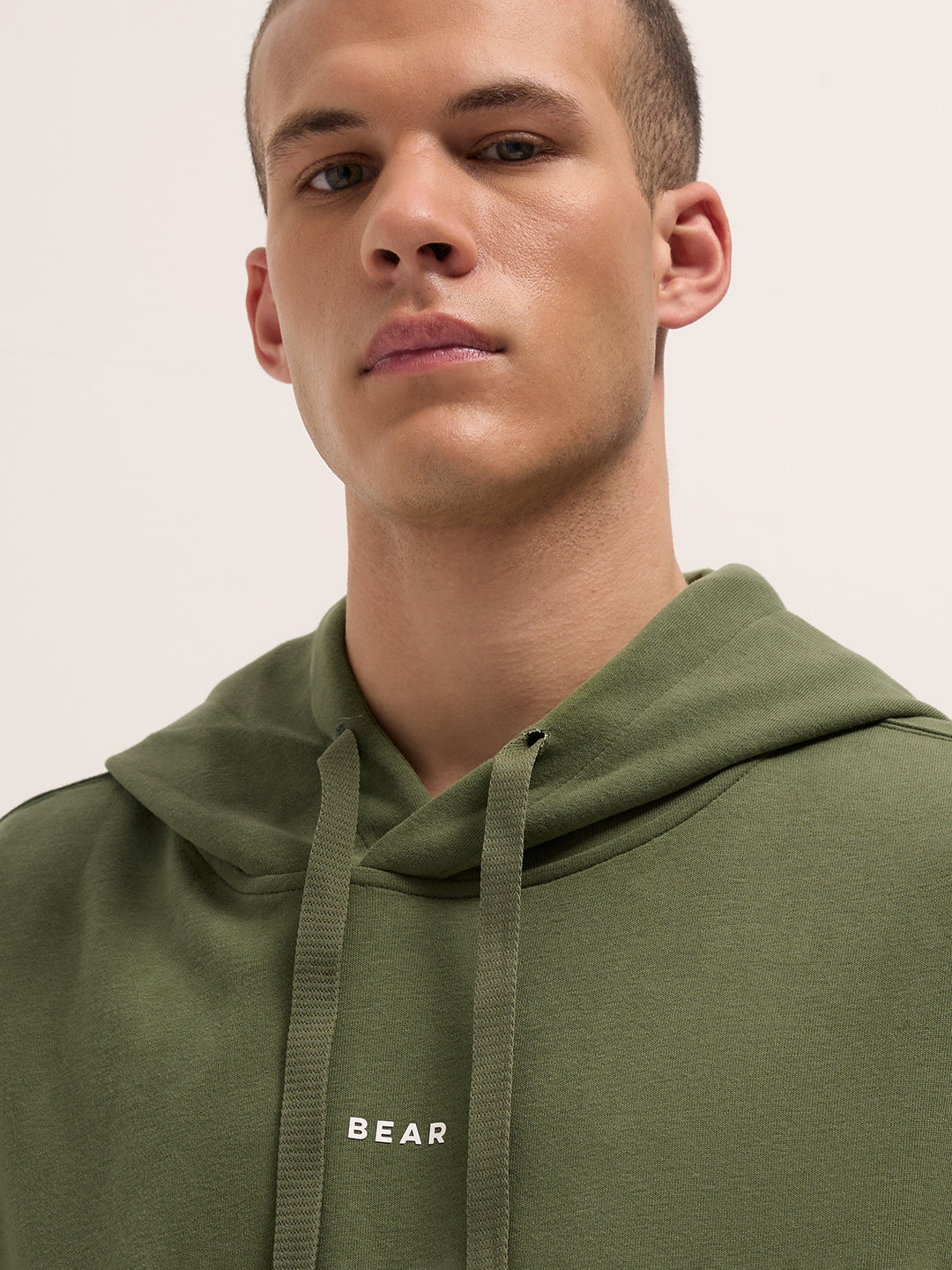 Men Green Solid Relax Fit Hoodie