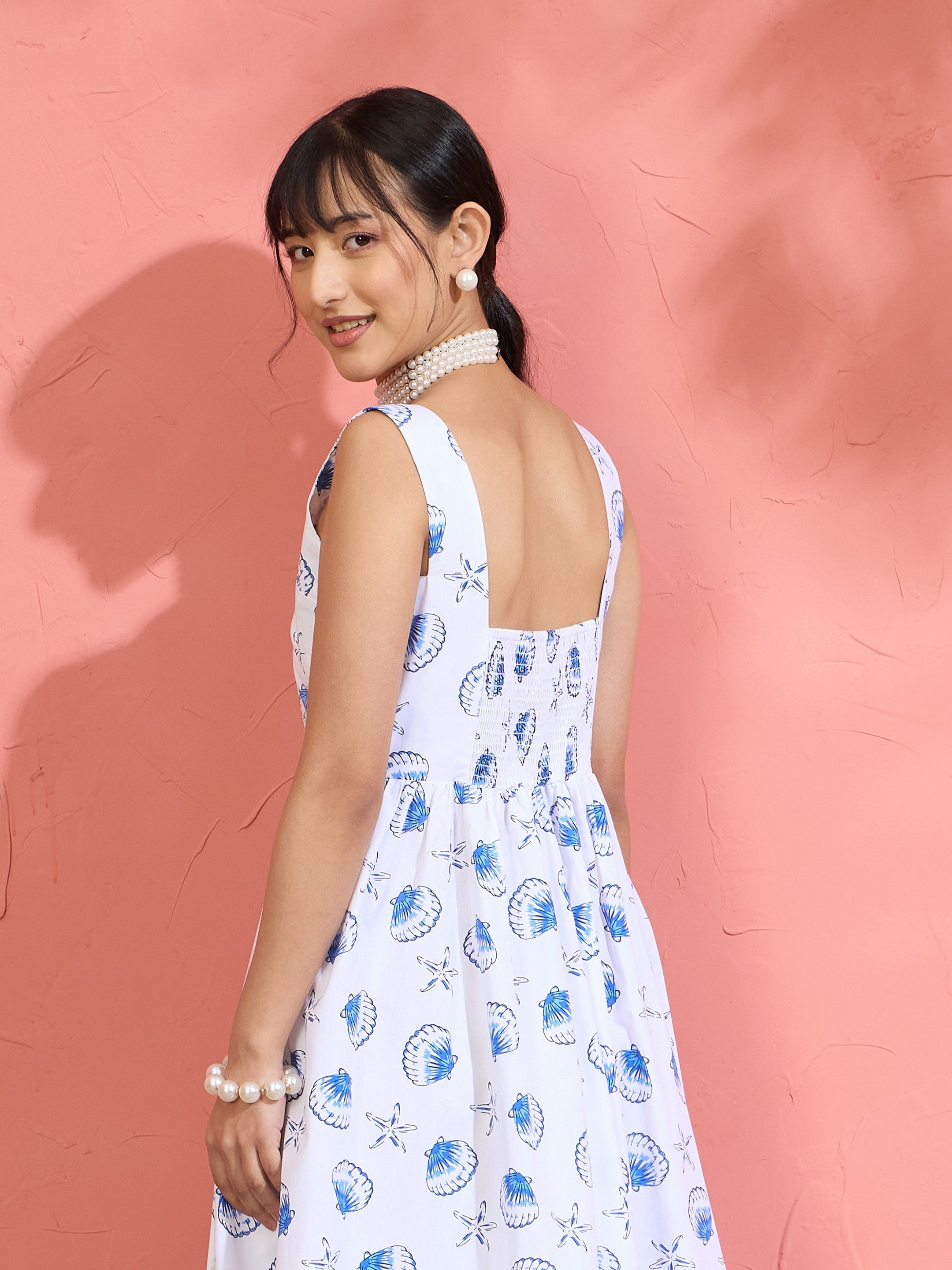 Women White & Blue Printed Sleeveless Button Down Midi Dress