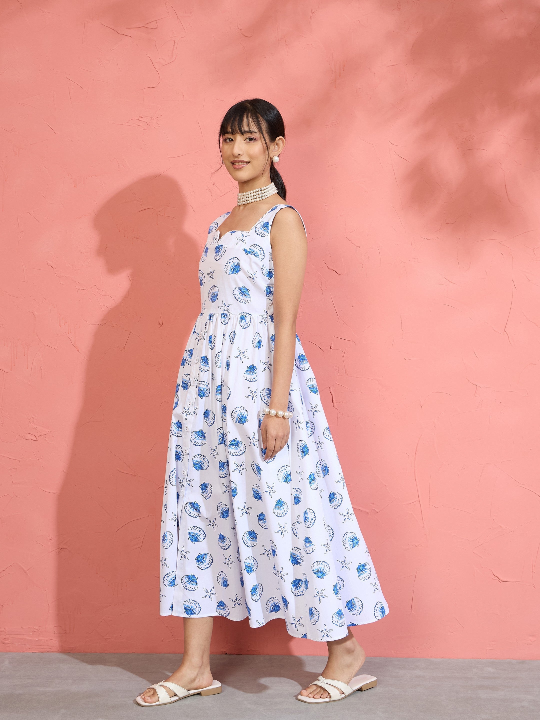 Women White & Blue Printed Sleeveless Button Down Midi Dress