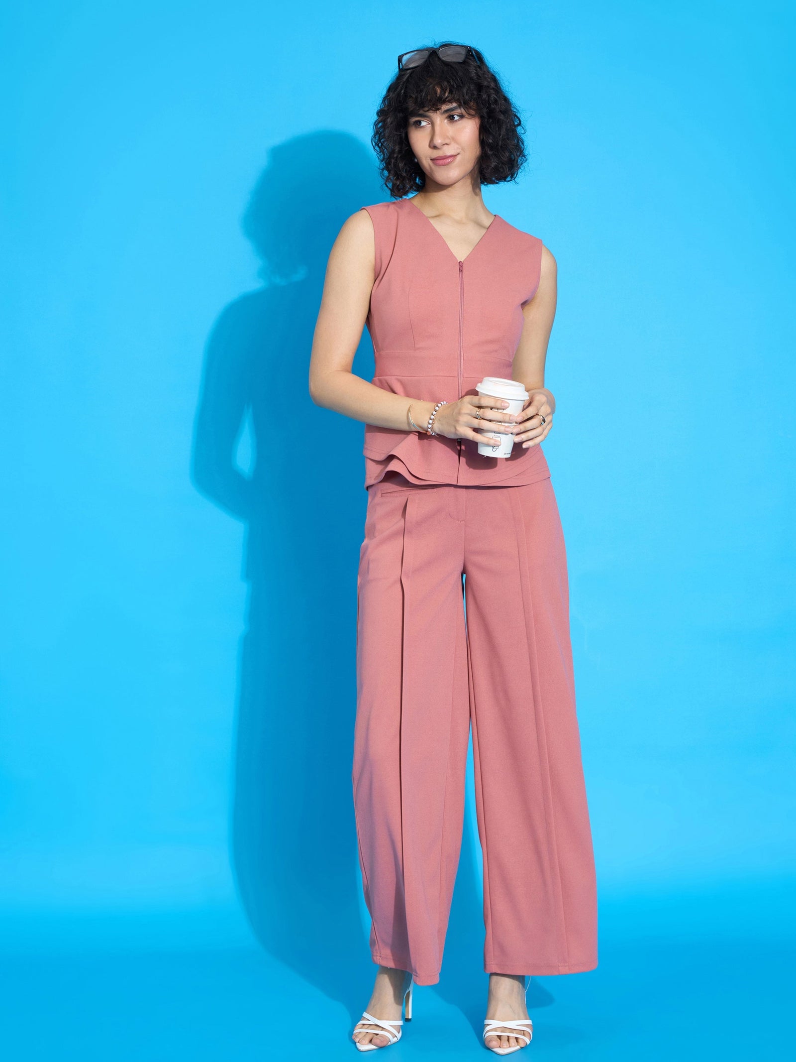 Women Peach Sleeveless Front Zipper Peplum Top
