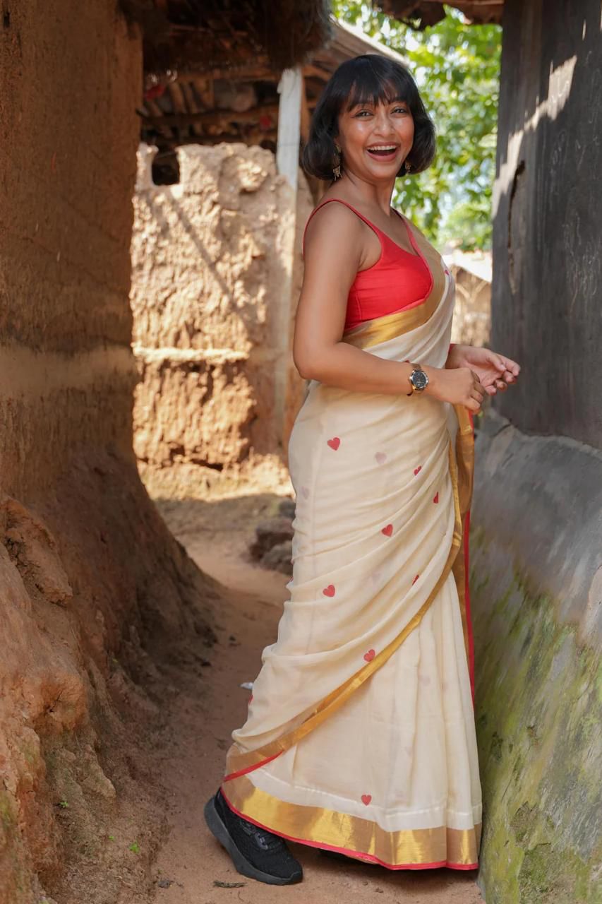 Women Off White Zari Border Love Design Saree