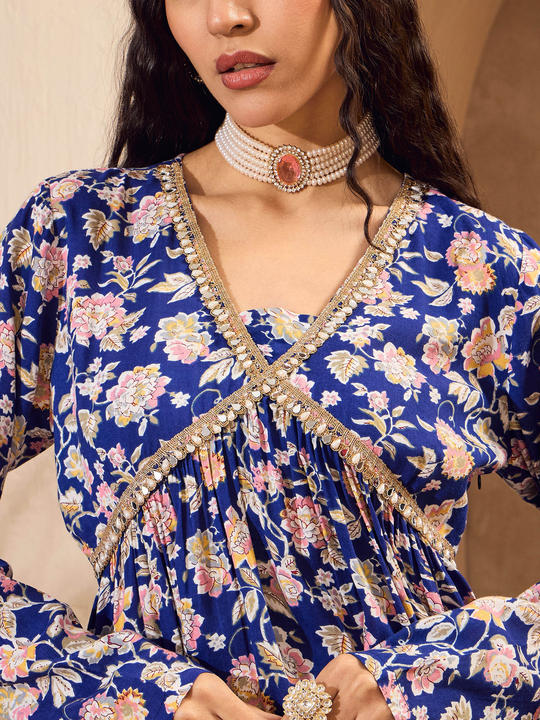 Women Blue Floral Cambric Peplum Top With Sharara Pants