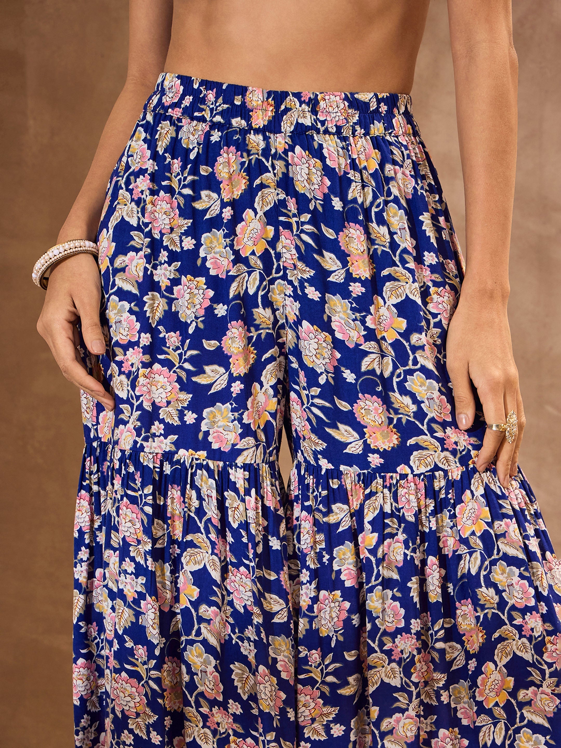 Women Blue Floral Cambric Peplum Top With Sharara Pants