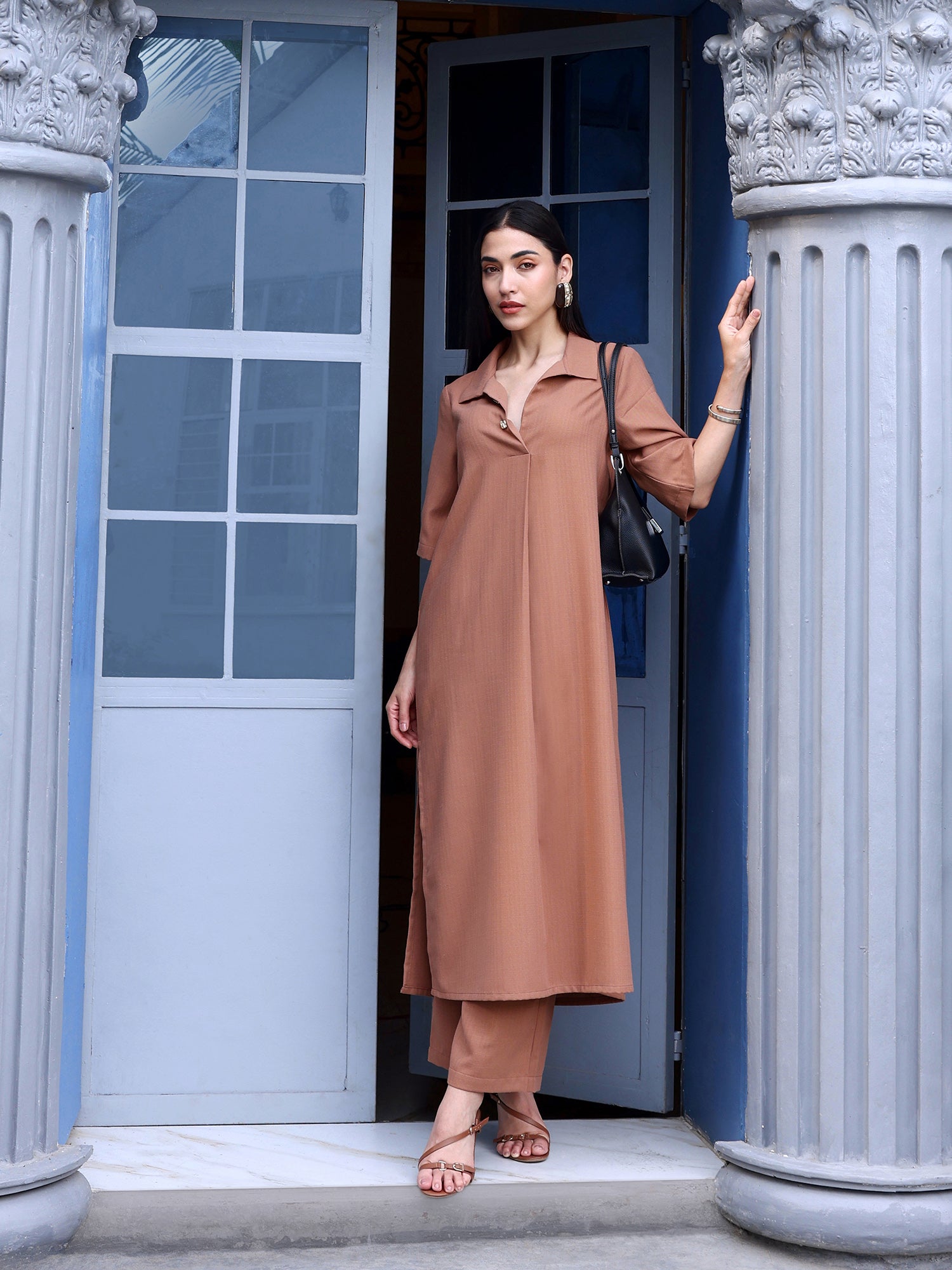 Women Brown Solid Polyblend Straight Kurta with Trouser Set