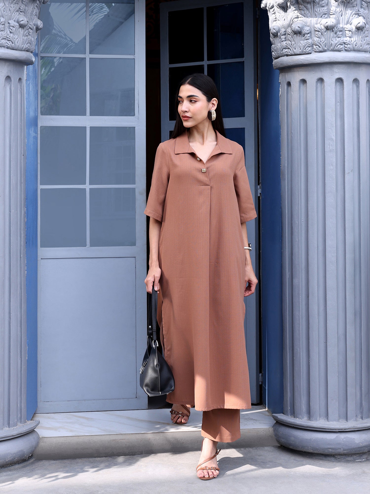 Women Brown Solid Polyblend Straight Kurta with Trouser Set
