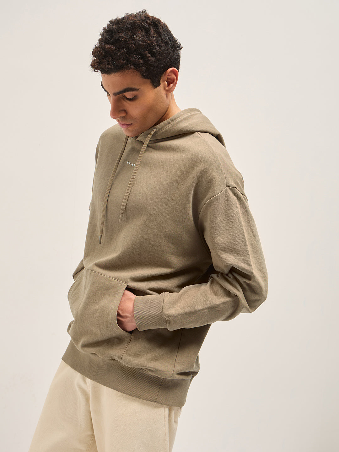 Men Beige Solid Relax Fit Hoodie