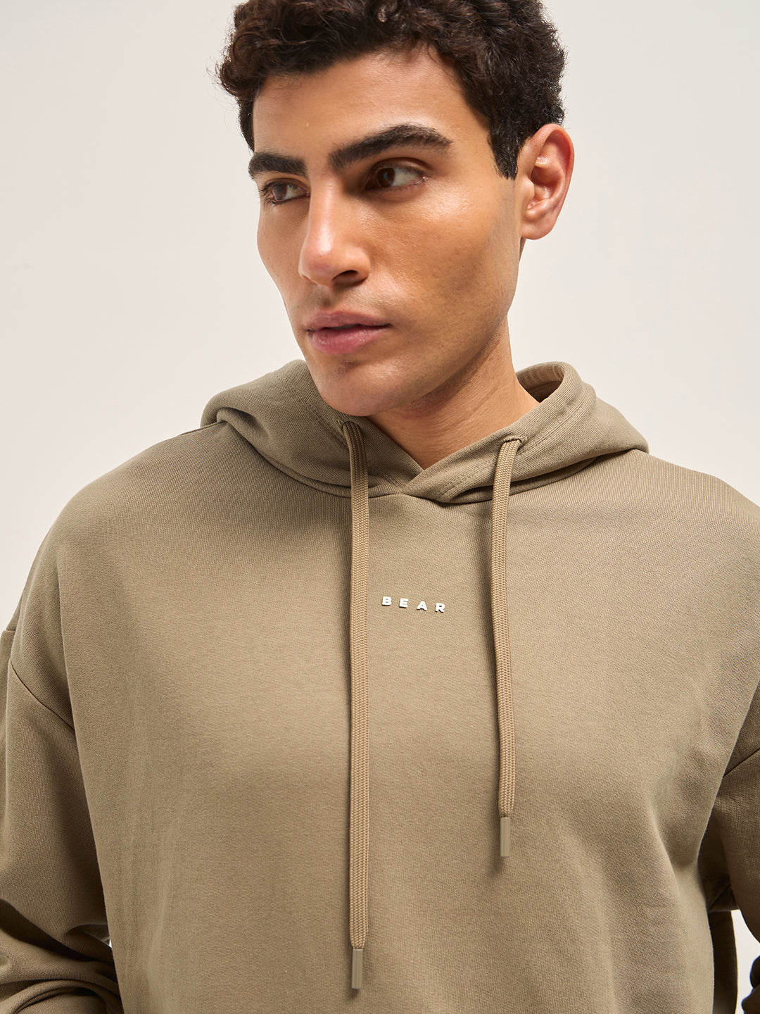 Men Beige Solid Relax Fit Hoodie