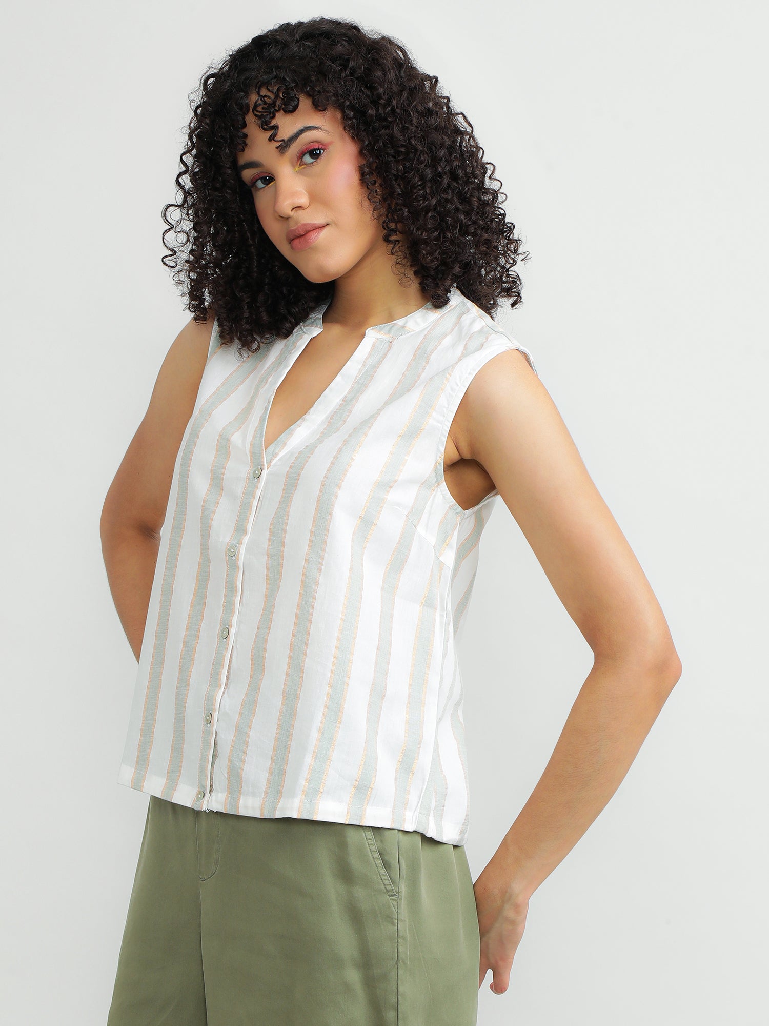 cream v neck sleeveless top