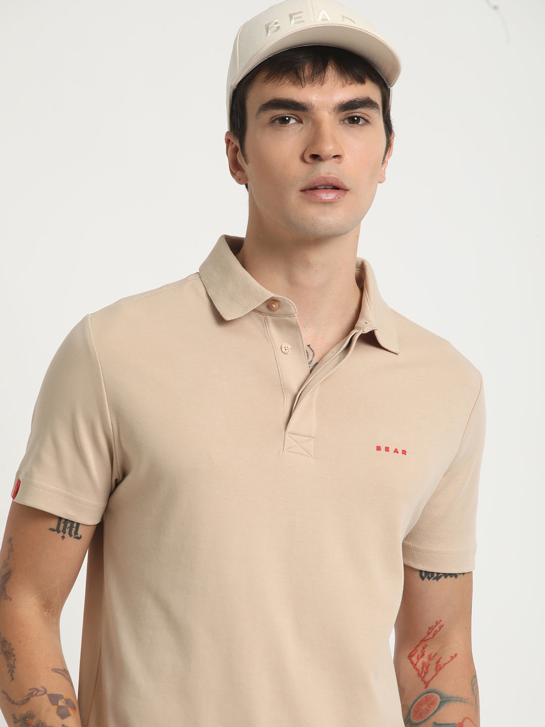 Men Beige Solid Slim Fit Polo Collar T-shirt