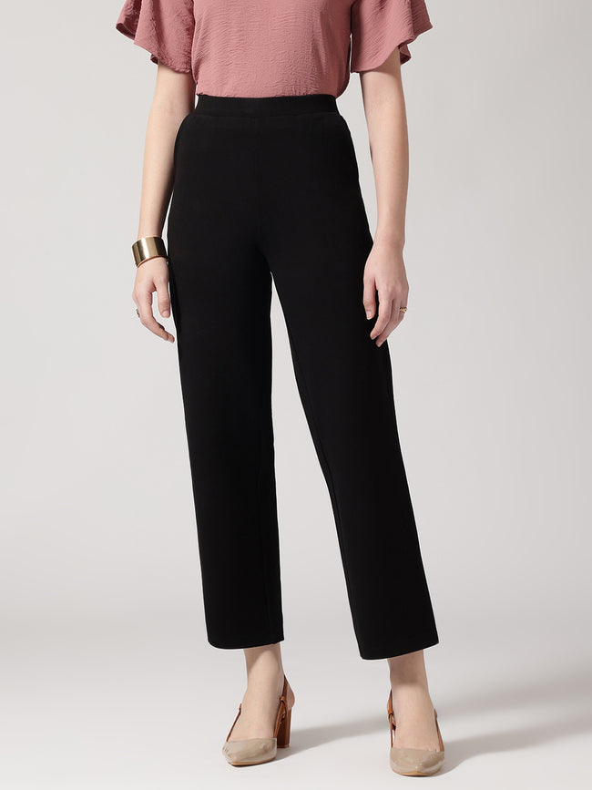 Women Black Solid High-Rise Trousers
