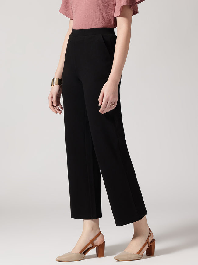 Women Black Solid High-Rise Trousers