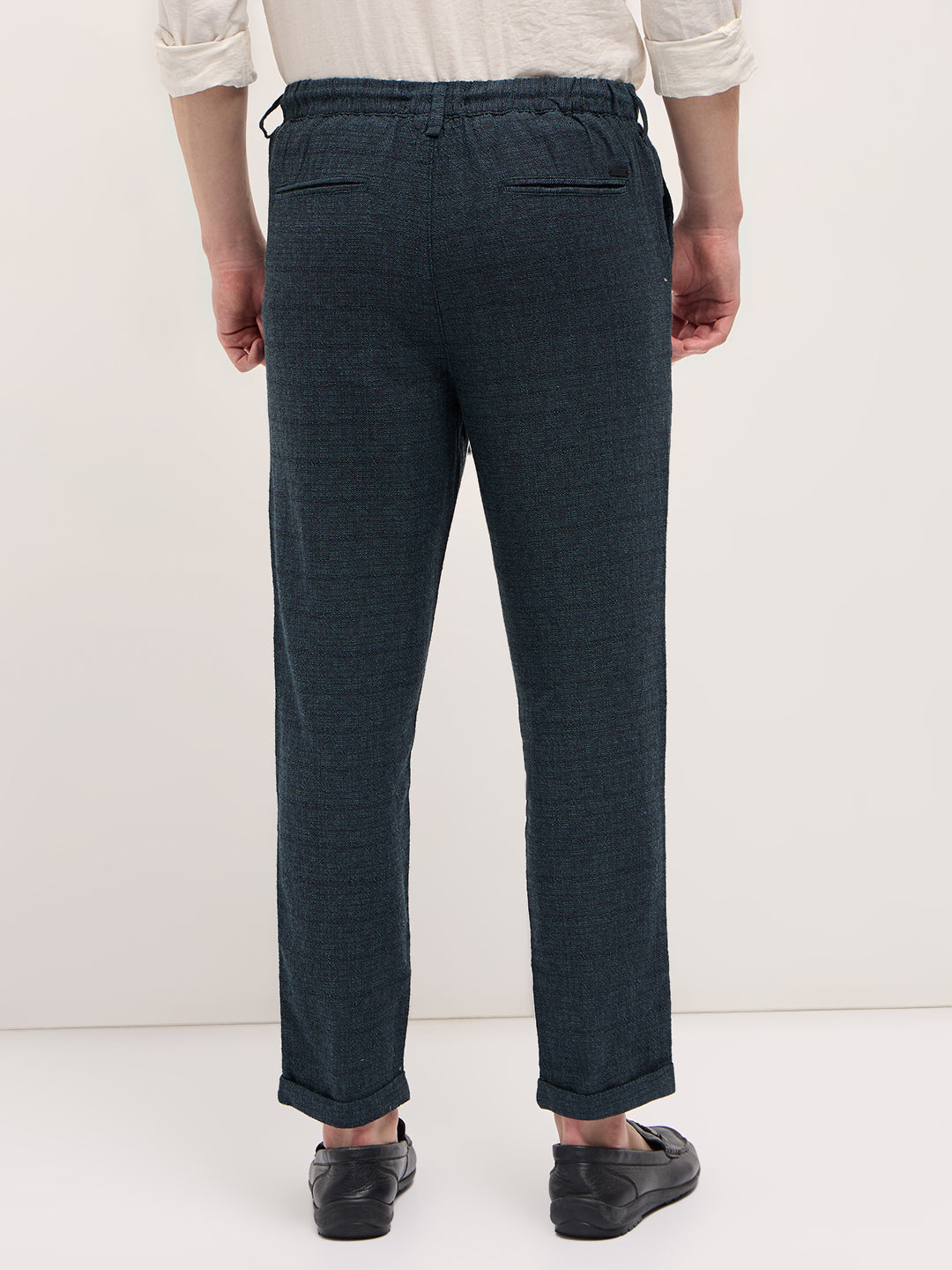 Men Teal Self Design Tapered Fit Elasticated Waist Casual Trouser