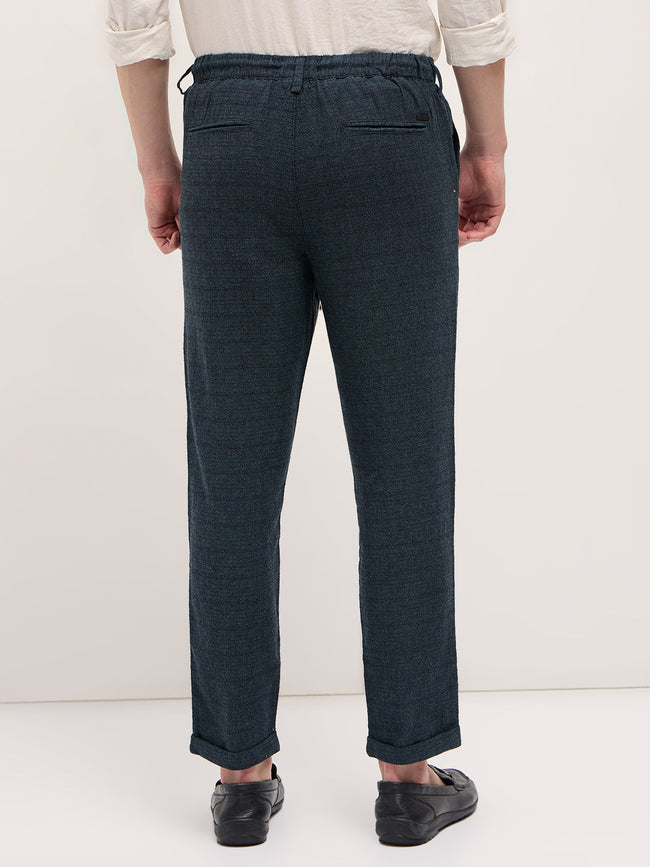 Men Teal Self Design Tapered Fit Elasticated Waist Casual Trouser