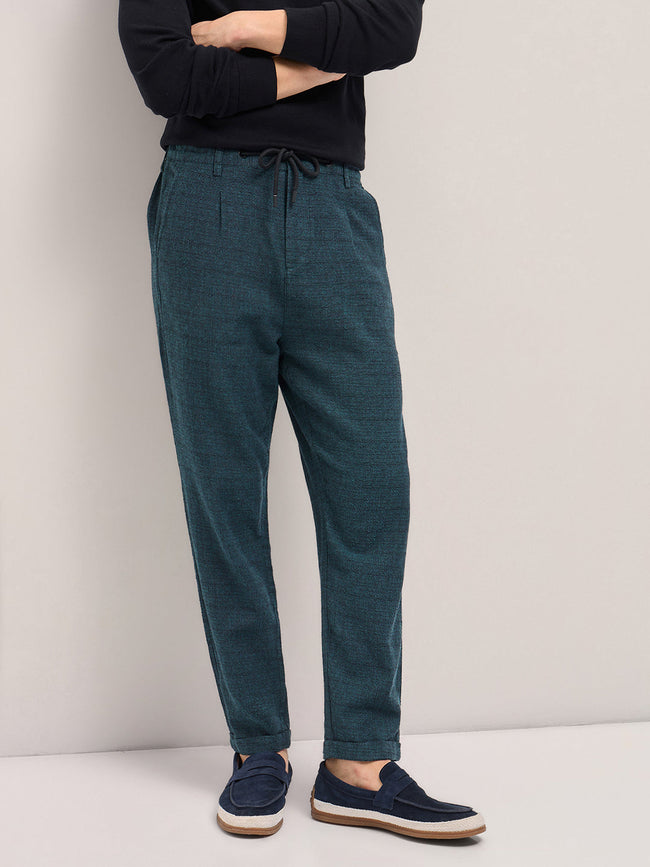 Men Teal Self Design Tapered Fit Elasticated Waist Casual Trouser