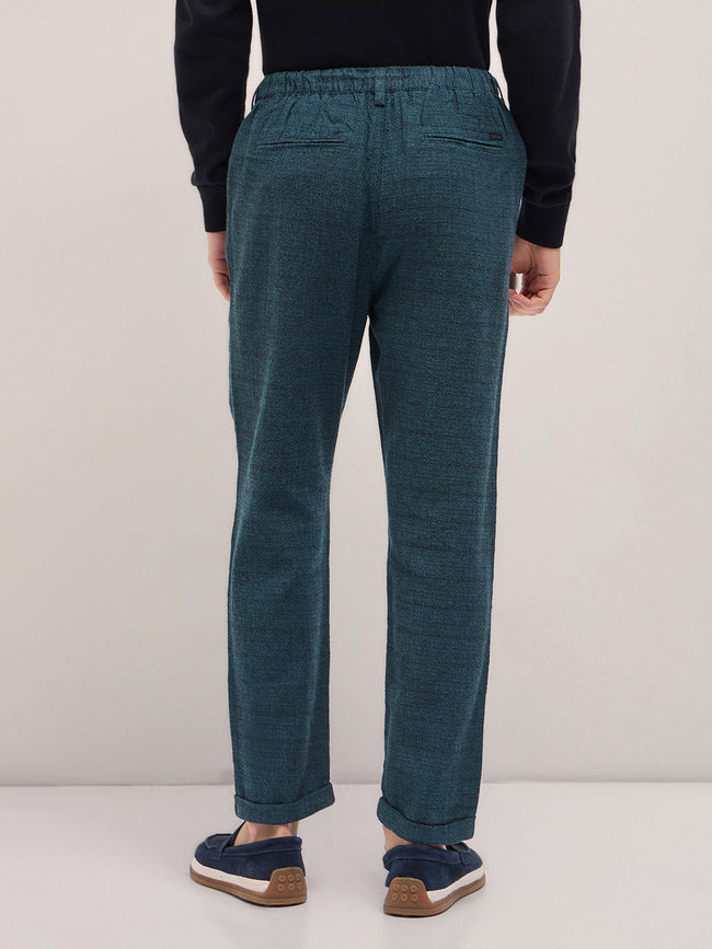 Men Teal Self Design Tapered Fit Elasticated Waist Casual Trouser
