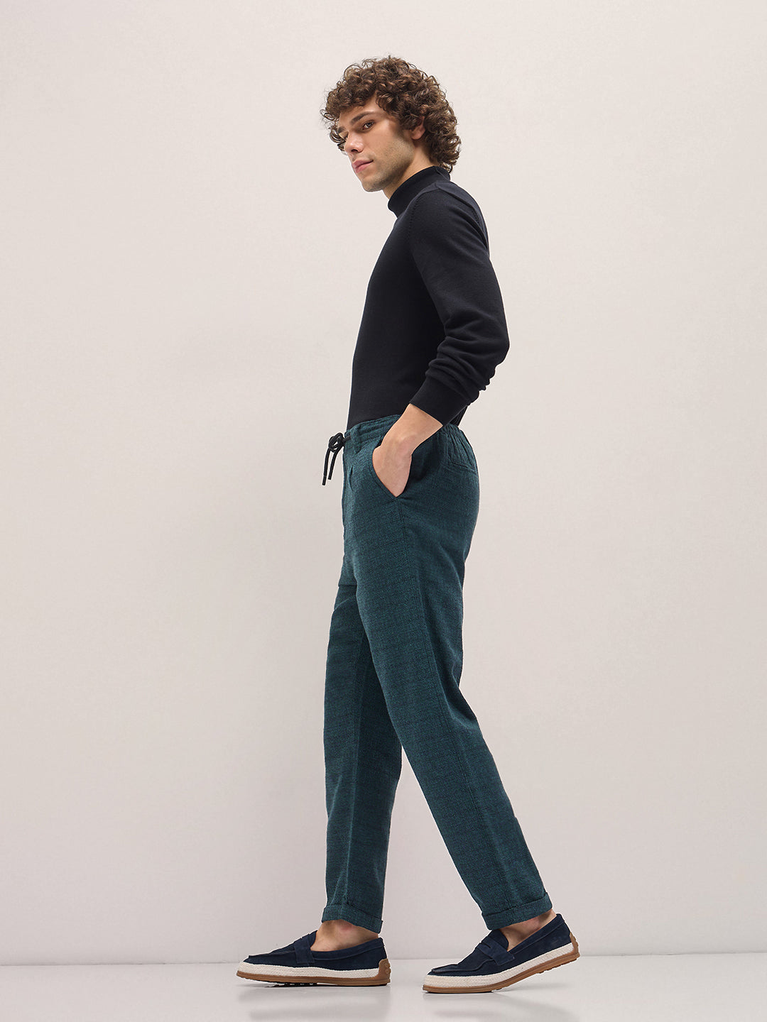 Men Teal Self Design Tapered Fit Elasticated Waist Casual Trouser