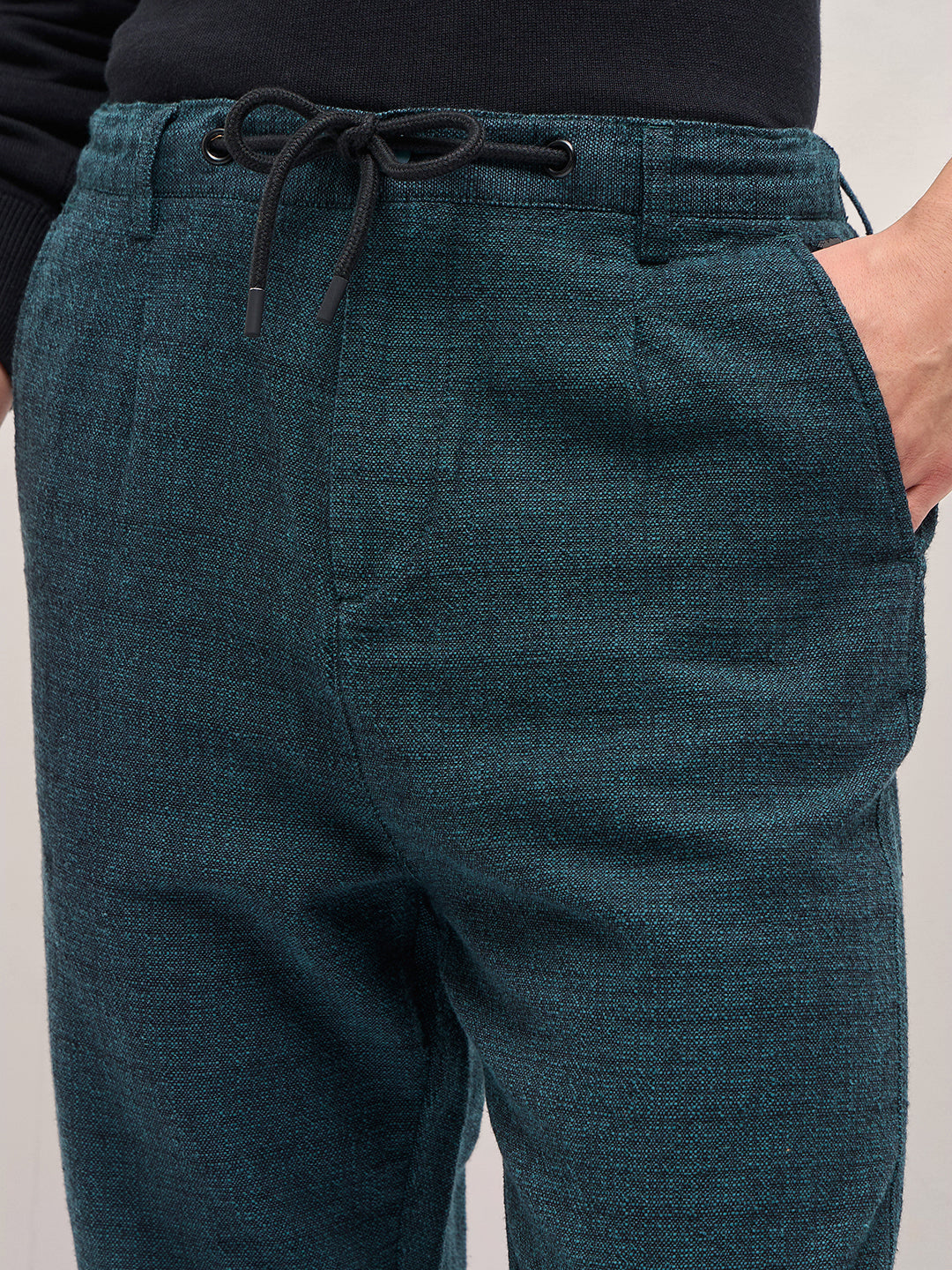 Men Teal Self Design Tapered Fit Elasticated Waist Casual Trouser