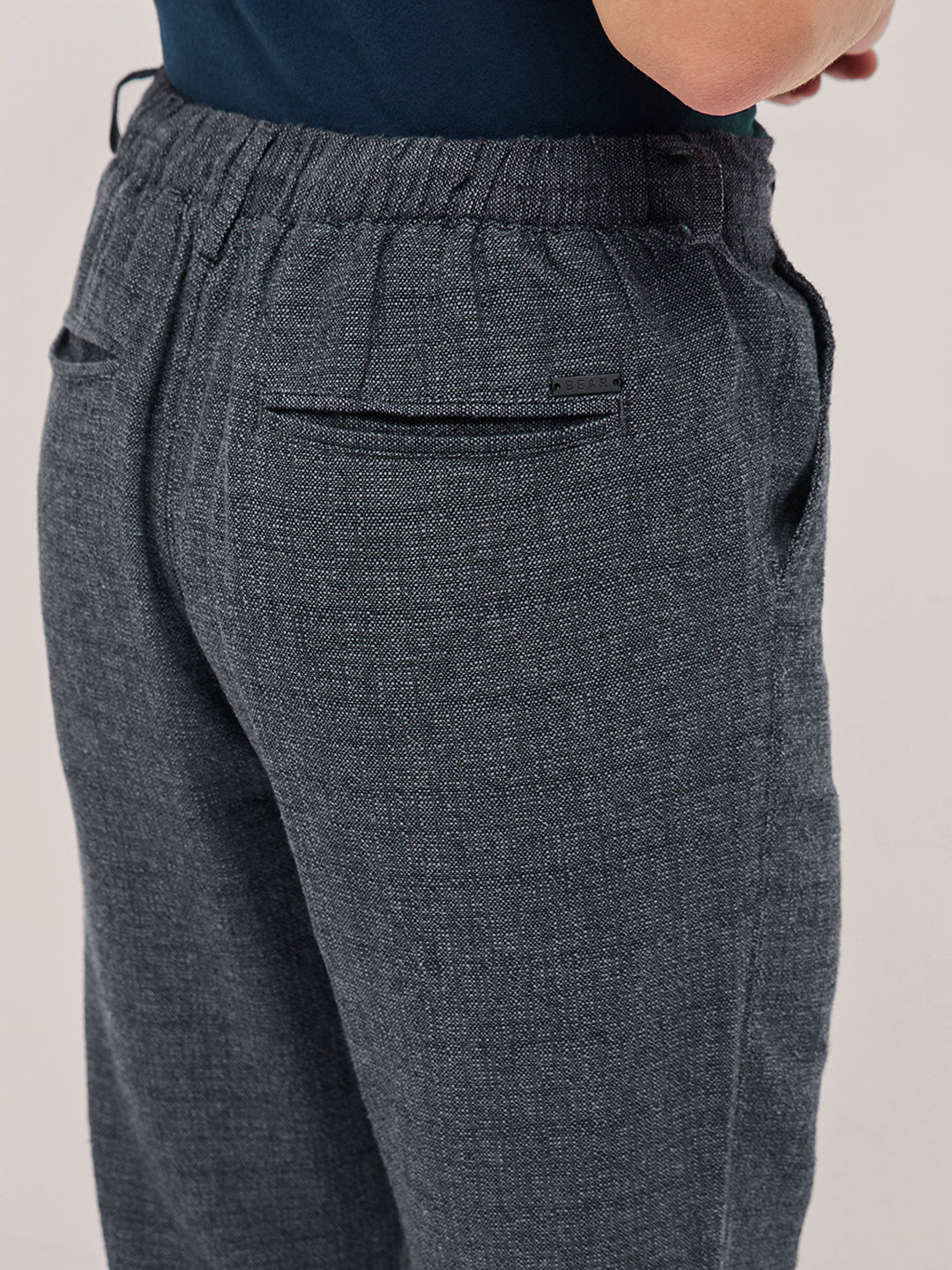 Men Grey Self Design Tapered Fit Elasticated Waist Casual Trouser