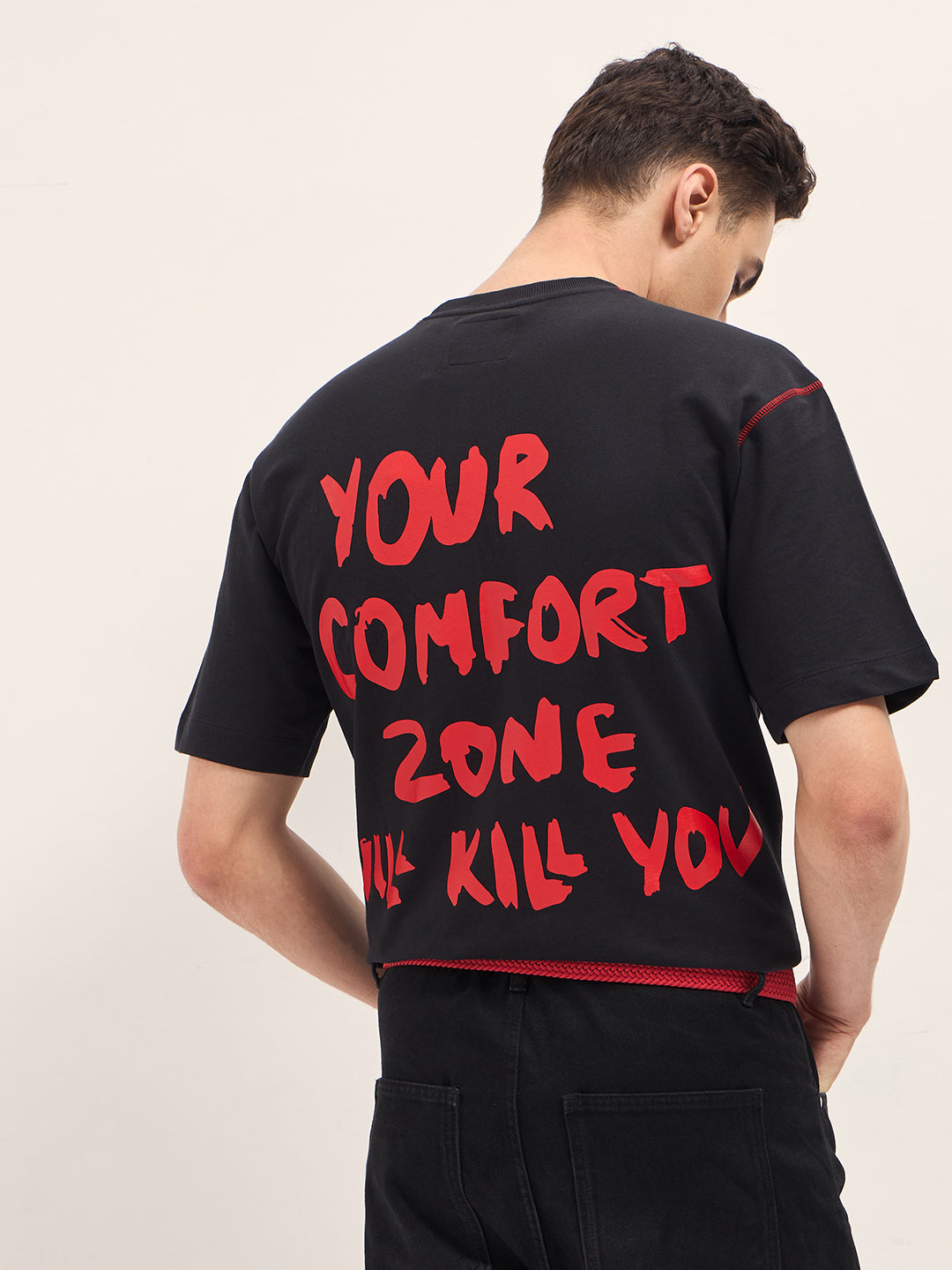 Men Black Graphic T-shirt Features a Bold Statement Back Design
