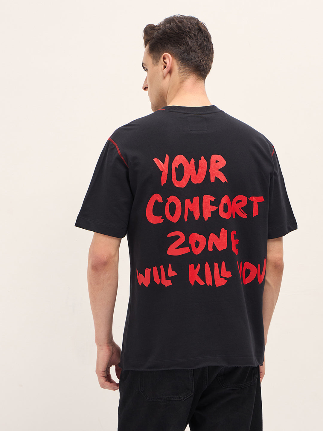 Men Black Graphic T-shirt Features a Bold Statement Back Design