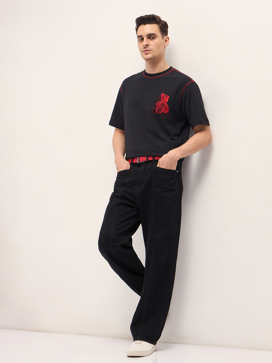 Men Black Graphic T-shirt Features a Bold Statement Back Design