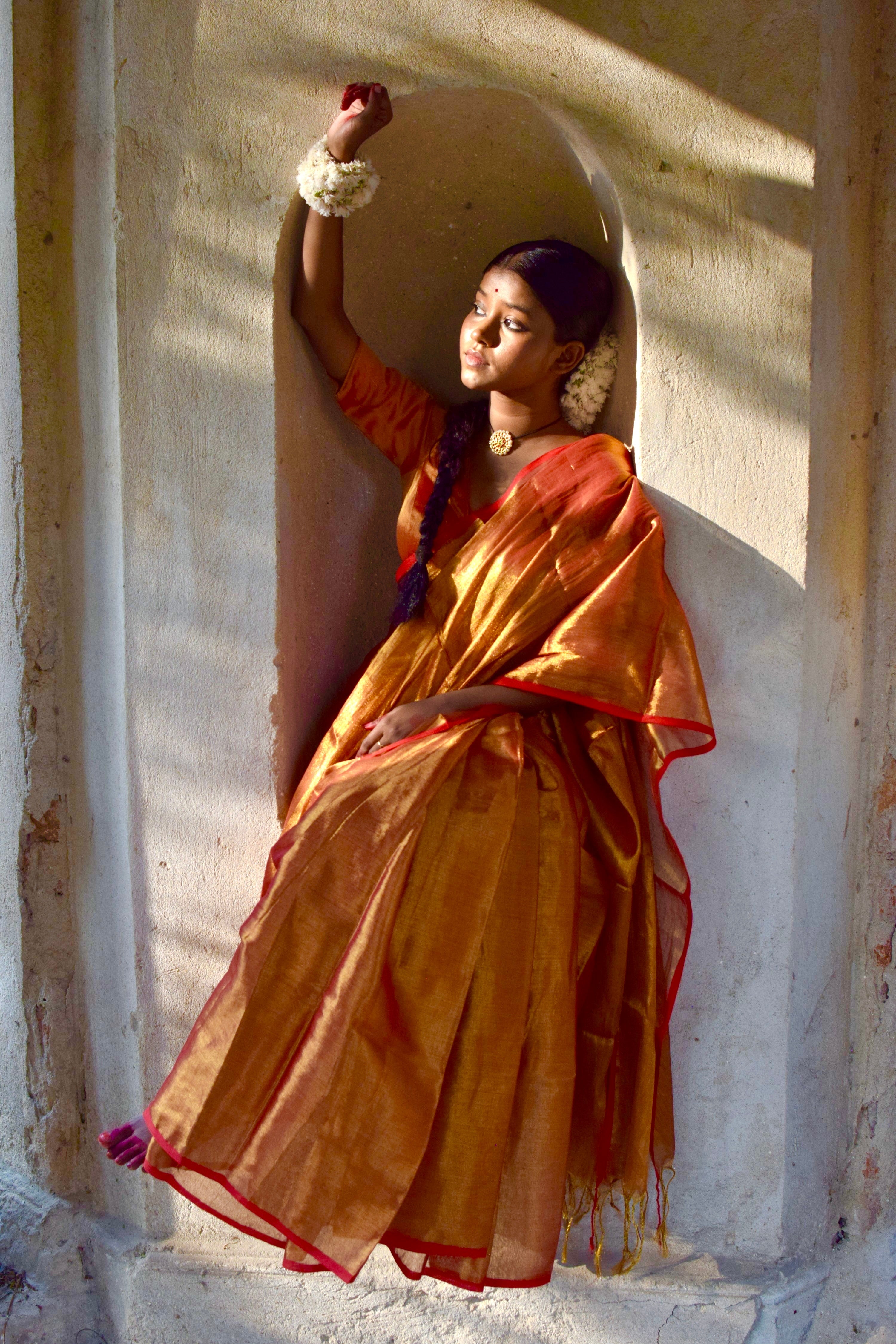 Tripataka Warm Gold Dual Tone Tissue Saree