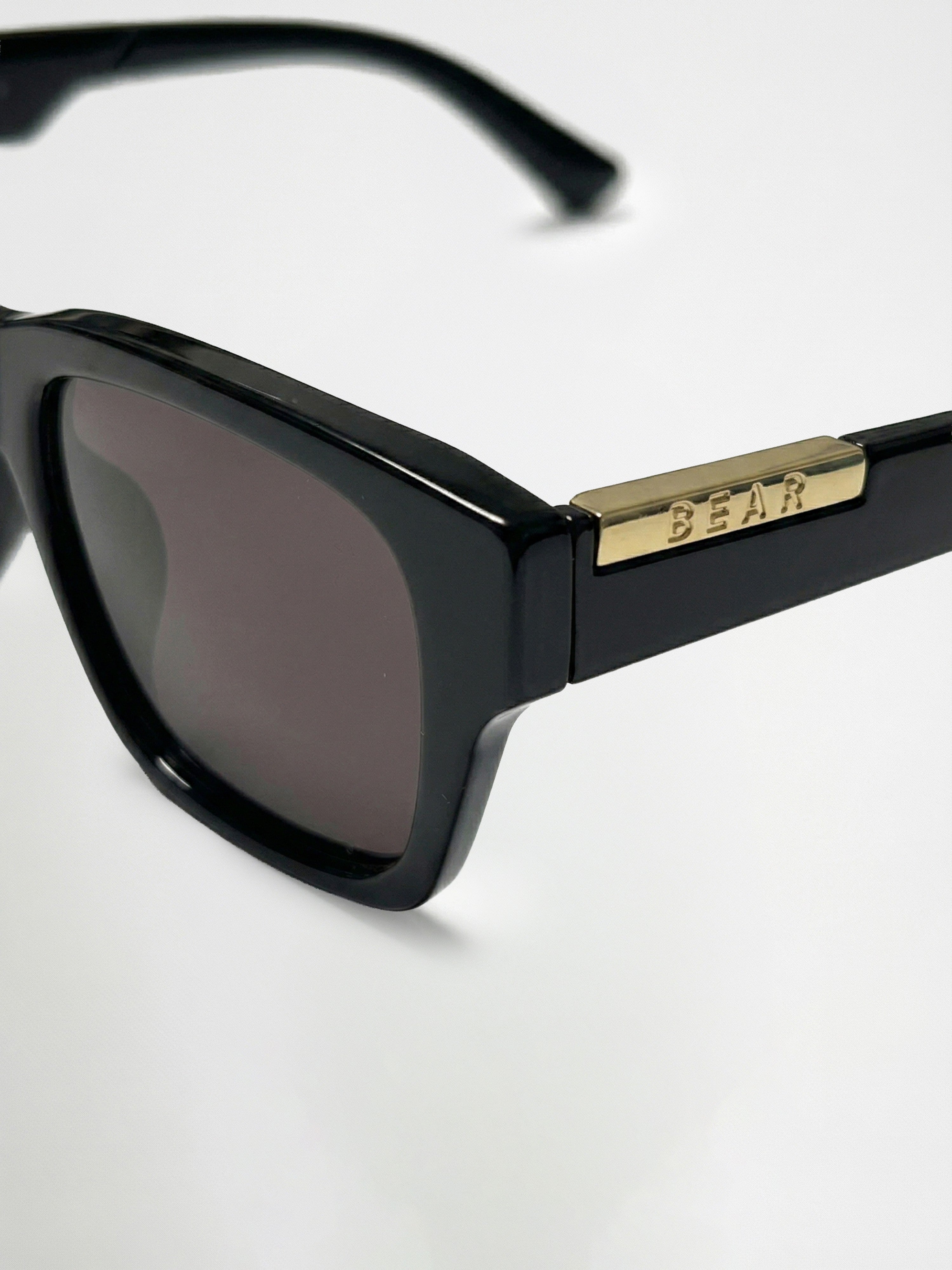 Men Glossy Black Rectangular Sunglasses with Gold Accent & Smoke Purple Lenses