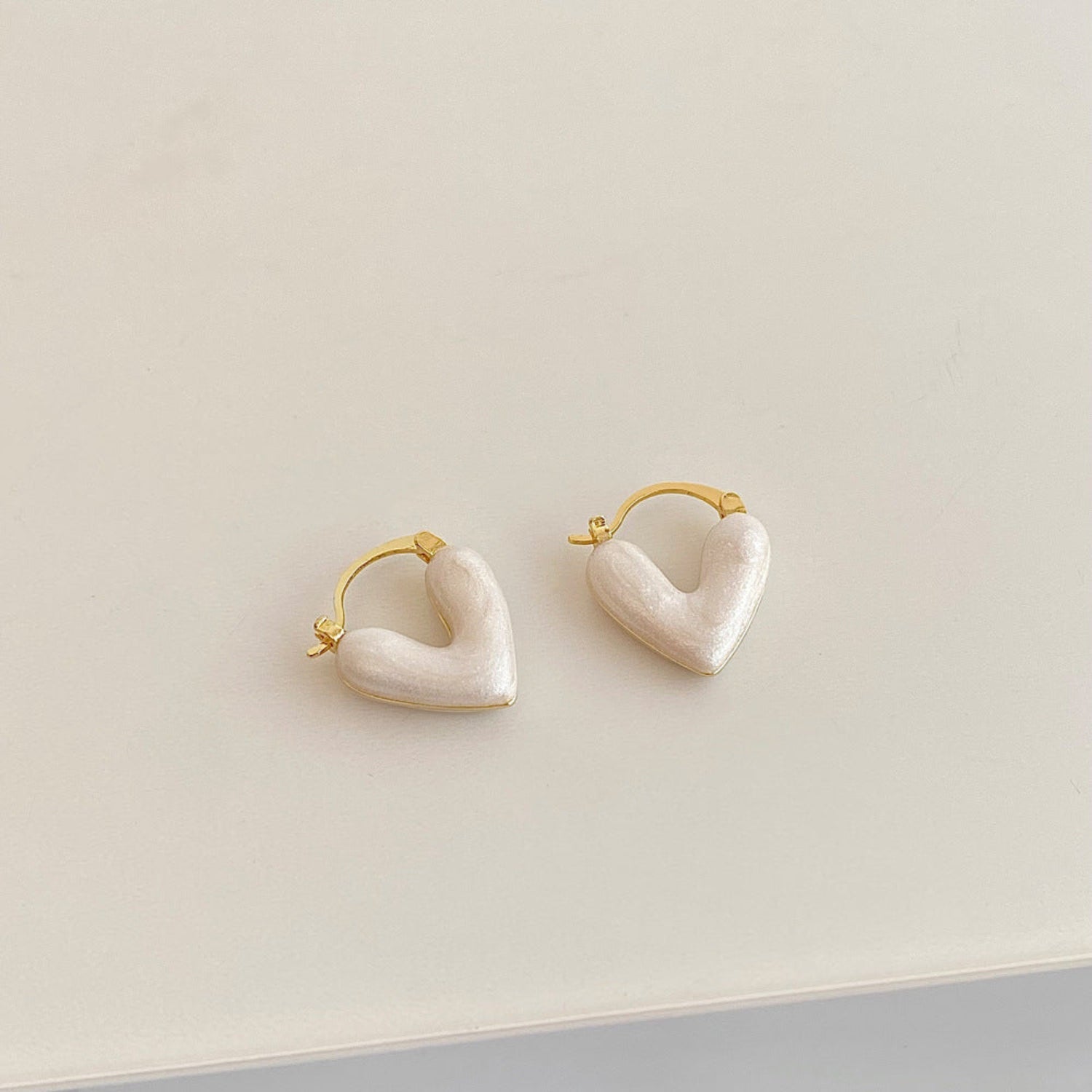Gold Hoop Earring With White Heart Charms